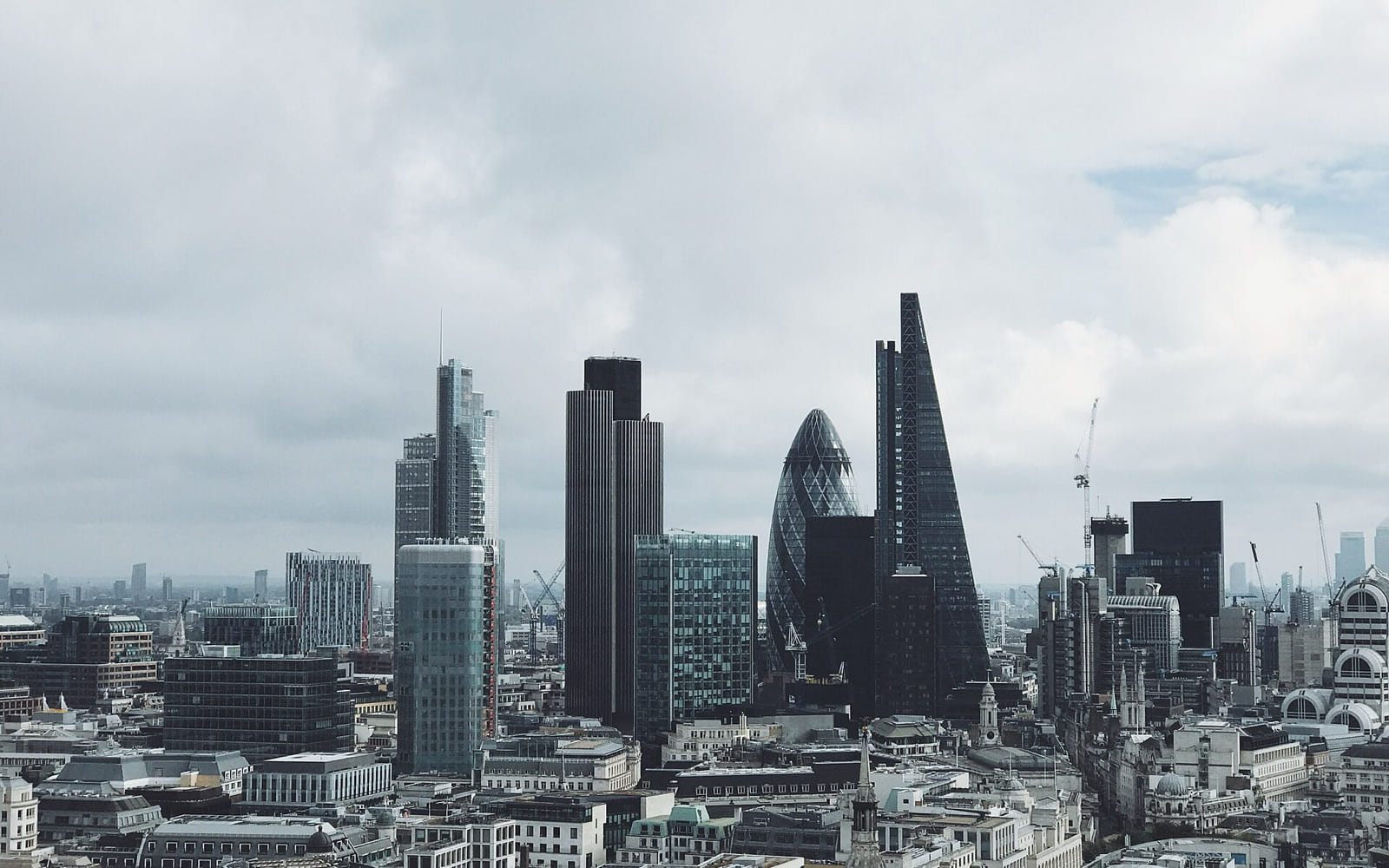 The City of London skyline under cloud